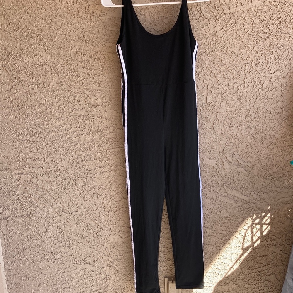 Woman’s sleeveless jumpsuit, onesie size small Black with white stripes